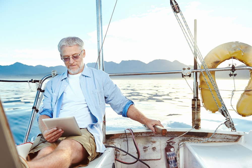 Retired Man Reading Tablet
