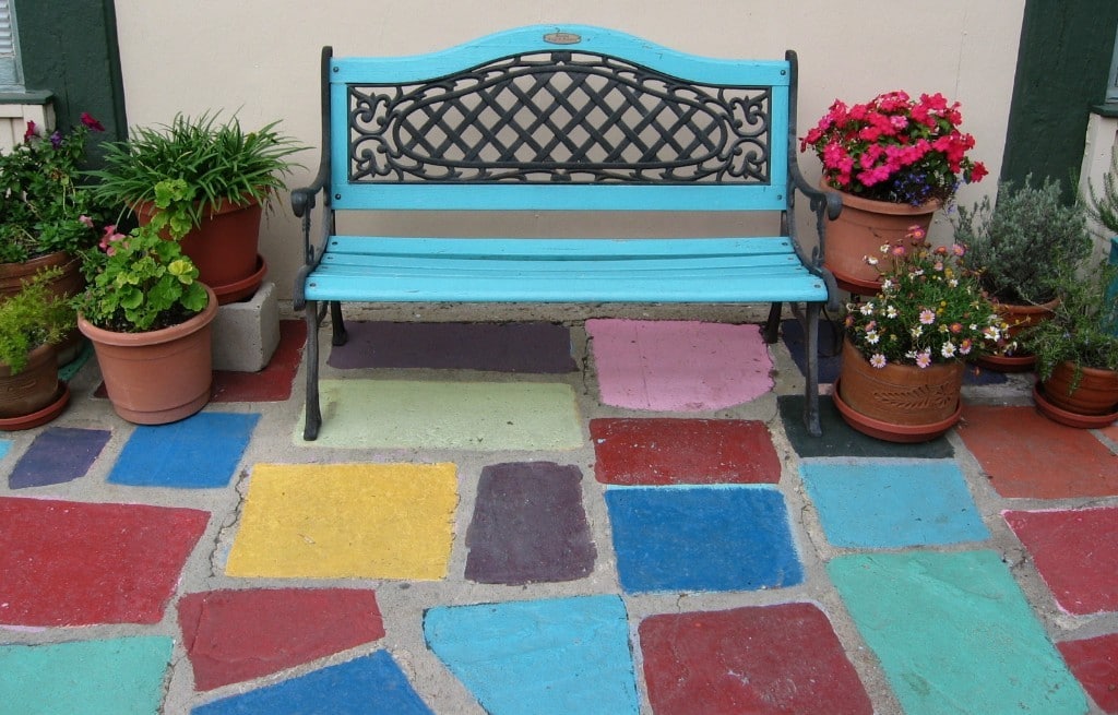 Blue bench on colored tile, representing Variable Whole Life Insurance